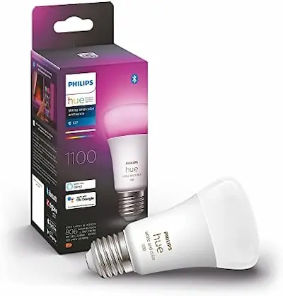Lâmpada inteligente Philips Hue ao lado de sua embalagem, destacando a compatibilidade com Bluetooth e Zigbee.